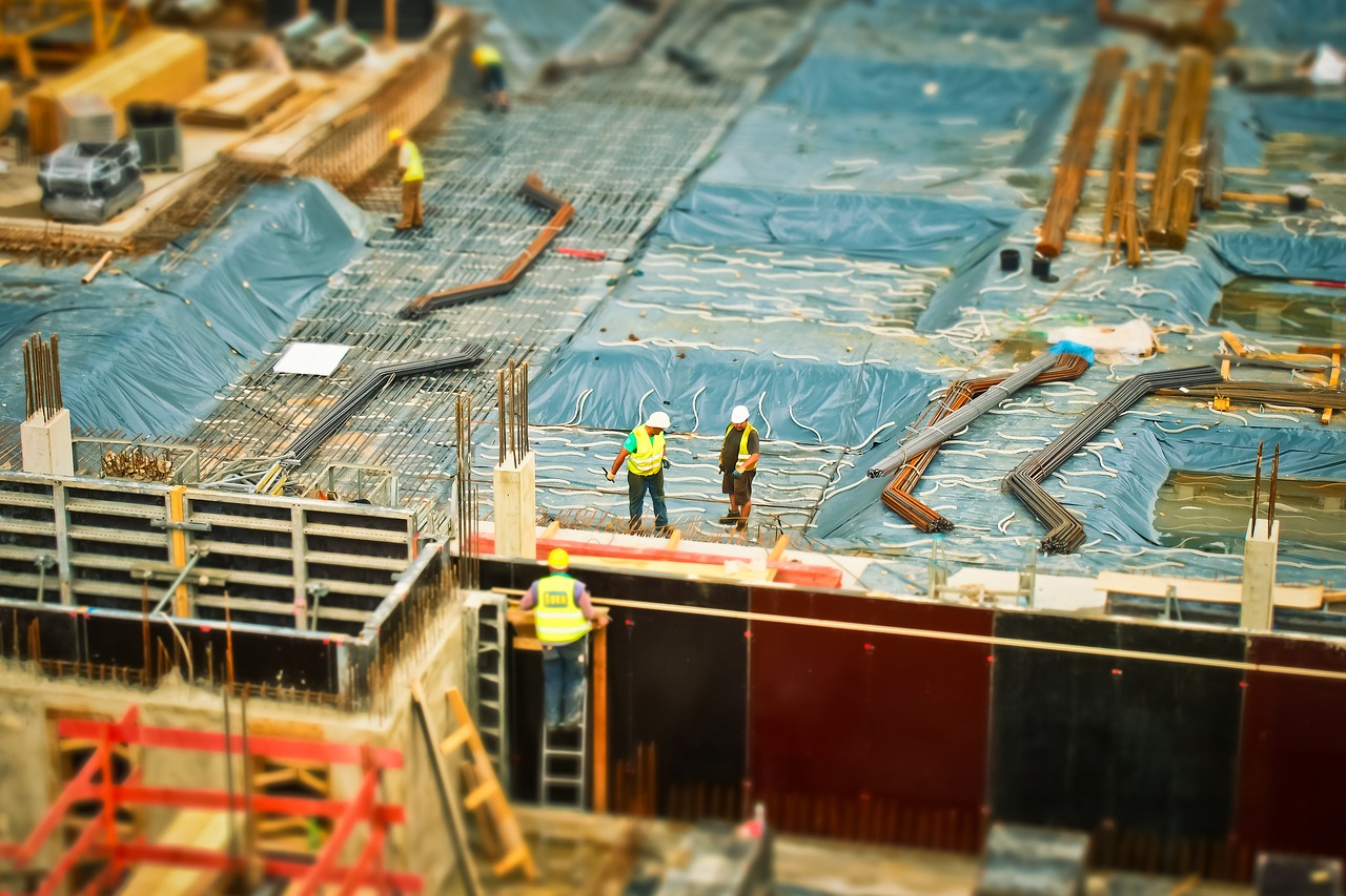 quantity surveying|Workplace with notebook on black background